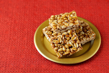 Peanut chikki peanut candy groundnut sweet Kappalndi Kadalai mittai Indian festival food snack...