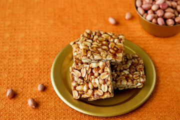 Peanut chikki peanut candy groundnut sweet Kappalndi Kadalai mittai Indian festival food snack Lohri Makar Sankranti Pongal Diwali harvest festival Tamil Nadu winter food festival Punjab North India.