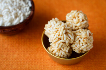 Murmura ladoo laddu puffed rice ball 
pori urundai Indian festival food snack sweet for Lohri Makar Sankranti Pongal Diwali harvest festival Tamil Nadu winter folk festival Punjab North India. 