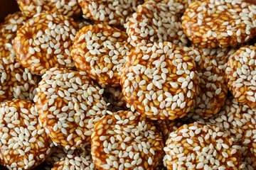 Revdi revri til gud revdi rewari sesame biscuit cookie winter food Indian festival food snack sweet Lohri Makar Sankranti Pongal Diwali harvest festival Tamil Nadu winter festival Punjab North India. 