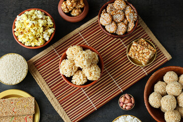 Murmura ladoo laddu puffed rice ball peanut chikki Revdi popcorn Indian festival food snack sweet Lohri Makar Sankranti Pongal Diwali harvest festival Tamil Nadu winter festival Punjab North India. 