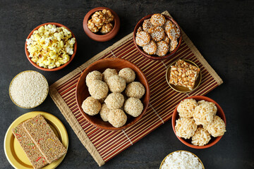 Til ladoo laddu white sesame ladoos Murmura laddu Revdi popcorn Indian festival food snack sweet...