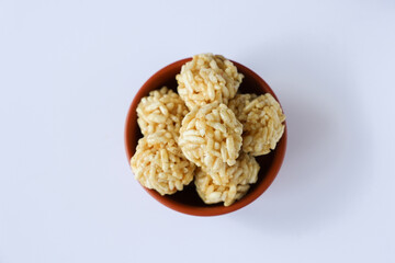 Murmura ladoo laddu puffed rice ball 
pori urundai Indian festival food snack sweet for Lohri Makar Sankranti Pongal Diwali harvest festival Tamil Nadu winter folk festival Punjab North India. 