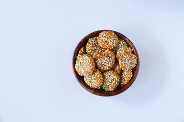 Revdi revri til gud revdi rewari sesame biscuit cookie winter food Indian festival food snack sweet Lohri Makar Sankranti Pongal Diwali harvest festival Tamil Nadu winter festival Punjab North India. 