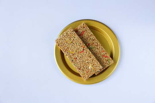 Til chikki Til Gajak, Til Gud Chikki, Sesame Chikki Indian festival food snack sweet Lohri Makar Sankranti Pongal Diwali harvest festival Tamil Nadu winter folk festival Punjab North India. 