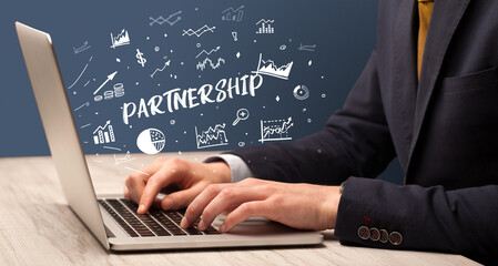 Businessman working on laptop, business concept