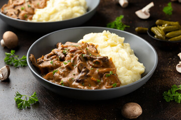 Beef Stroganoff with mushrooms and mashed potatoes.