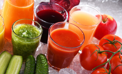 Glasses with fresh organic vegetable and fruit juices