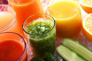 Glasses with fresh organic vegetable and fruit juices