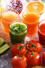 Glasses with fresh organic vegetable and fruit juices