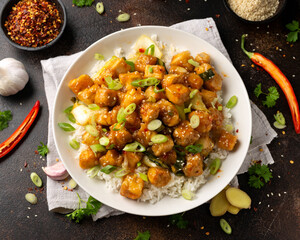 General Tso Tofu with rice, green onion and pak choi. Asian Vegan Food