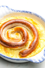 sausage baked with mashed potatoes