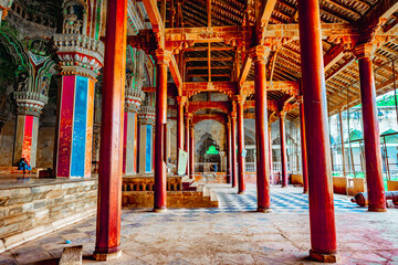 Thanjavur, Tamil Nadu, India - The high arches artworks and colorfully painted wall murals and...