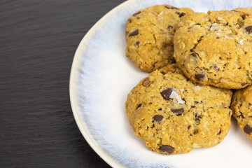rolled oats chocolate chip peanut butter cookie with pretzel sticks