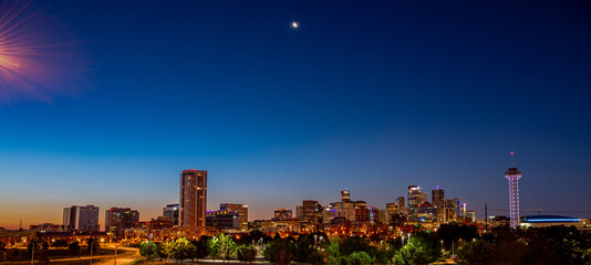 Night sky over Denver Colorado with moon