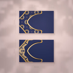 Dark blue business card template with vintage gold ornaments for your brand.