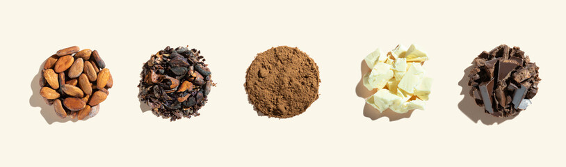 Creative composition with healthy ingredient organic cocoa products: beans, powder, butter, chocolate on a ivory background. Concept energy superfood, brain food. flat lay. Copy space.