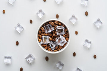 Creative concept of iced coffee on a gray background. Top view.