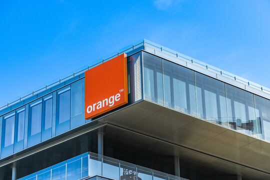 Orange logo on the Orange S.A headquarters building in Issy les Moulineaux near Paris, France