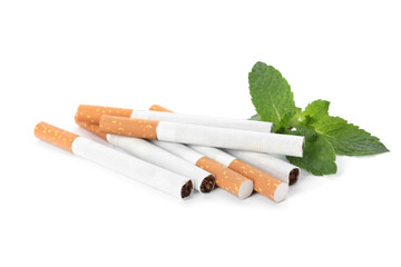 Menthol cigarettes and fresh mint leaves on white background