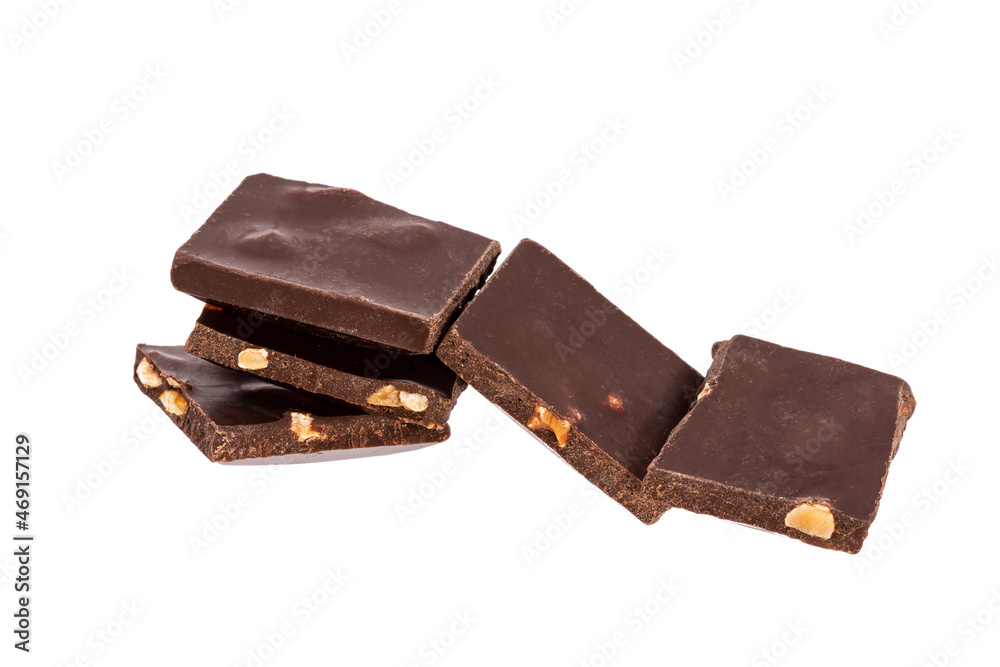 Poster pieces of chocolate with nuts lie side by side isolated on white background