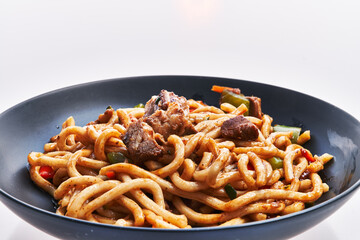  Plate of noodles isolated on a white background