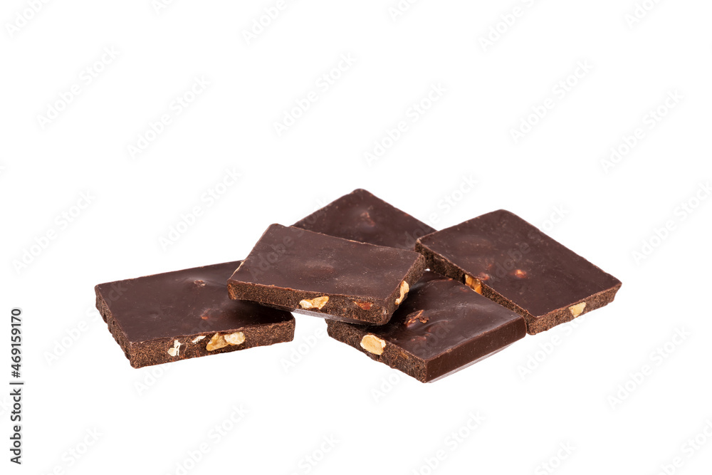 Poster chocolate with nuts in a heap isolated on white background