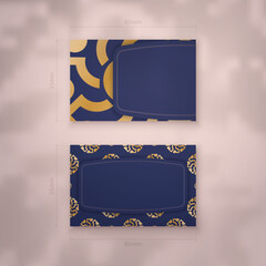 Visiting business card in dark blue color with abstract gold pattern for your contacts.