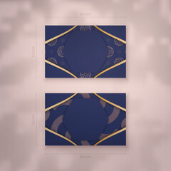 Visiting business card in dark blue color with vintage gold ornament for your contacts.