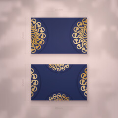 Visiting business card in dark blue with Indian gold ornaments for your personality.