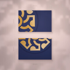 Visiting business card in dark blue with vintage gold pattern for your business.