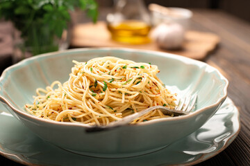 Close-up of a plate of spaghetti AGLIO E OLIO
