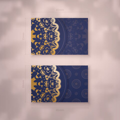 Visiting business card template in dark blue color with luxurious gold ornaments for your brand.