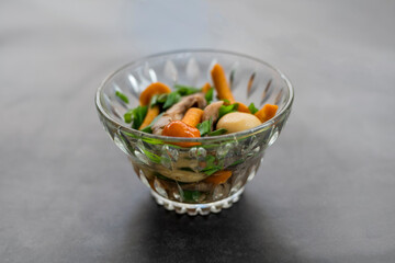 pickled honey mushrooms in a glass plate