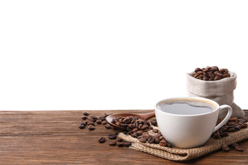 Cup of aromatic hot coffee and beans on wooden table against white background. Space for text