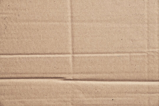 Rustic brown paperboard. Rough cardboard kraft texture © Krakenimages.com