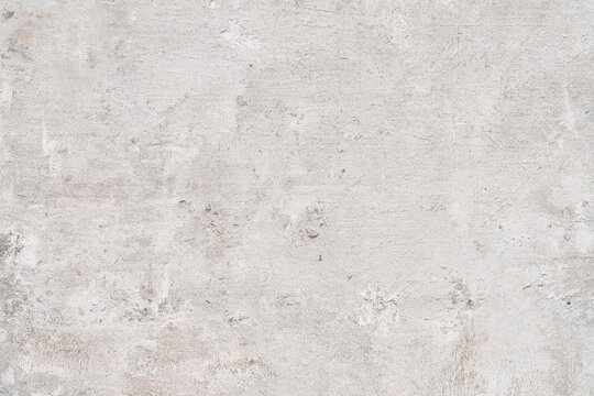 Concrete wall texture with rusty surface. Classic cement surface background © Krakenimages.com