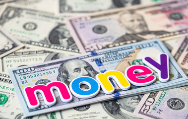 money colorful inscription on US dollar
