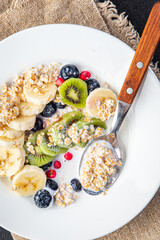 oatmeal bowl fruit breakfast vegetable milk, lactose free, banana, kiwi, berrie, blueberrie meal...