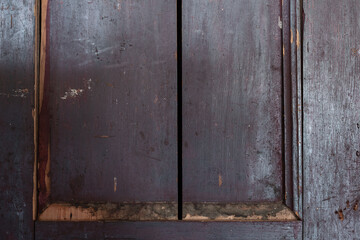 Very old, grunge and aged purple wooden rural closet or locker doors background with copy space. HDR image