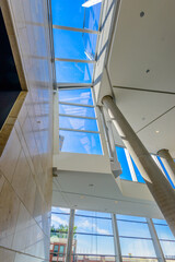 Obraz premium Abstract fragment of the architecture of modern lobby, hallway of the luxury hotel, shopping mall, business center in Vancouver, Canada. Interior design.