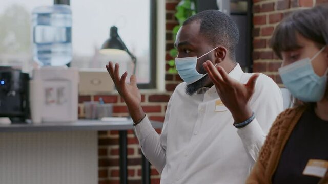 Close Up Of African American Man Explaining Addiction And Mental Health Problems At Aa Meeting. Person With Face Mask Talking To People At Therapy Session During Covid 19 Pandemic.