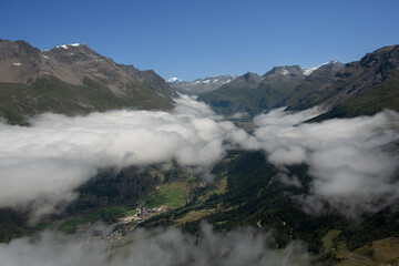 sea of clouds over the Mont Cenis lake in the French Alps