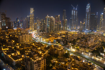 Night cityscape  inlcude  mix of Low and High rise buildings in Dubai downtown
