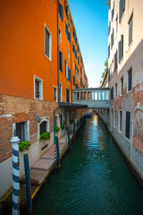 Fototapeta na wymiar Canal view in the city of Venice on a sunny day