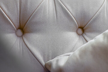 sofa pillow, comfortable couch cushion in beige neutral color, soft cozy domestic furniture texture
