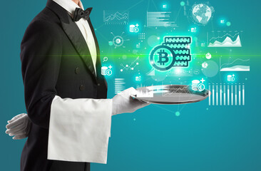 Handsome young waiter in tuxedo holding currency icons on tray
