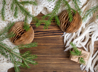 Christmas background. Handmade Christmas balls, a warm scarf, christmas tree. Zero waste