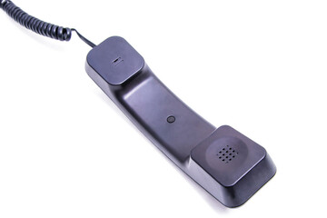 corded landline phone handset isolated on white