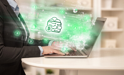 Young man watching stock market on laptop